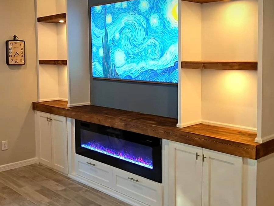 Custom built-in media wall with linear fireplace
