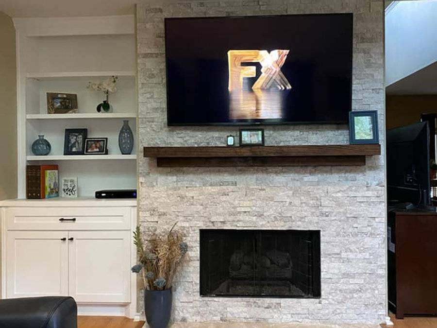Stone fireplace with a built-in media wall