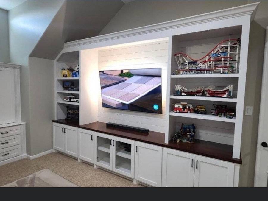 Built-in cabinetry and shelving fabricated for a family room