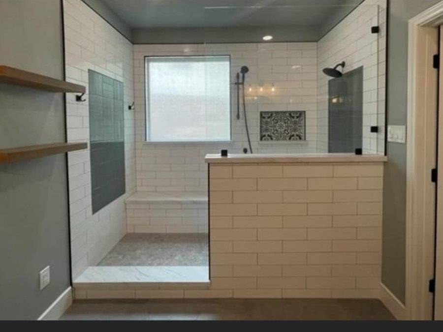 Shower area with backer board and tile started