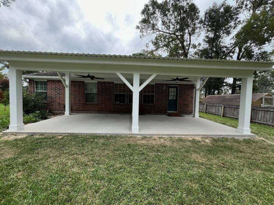 Covered patio addition with cedar posts